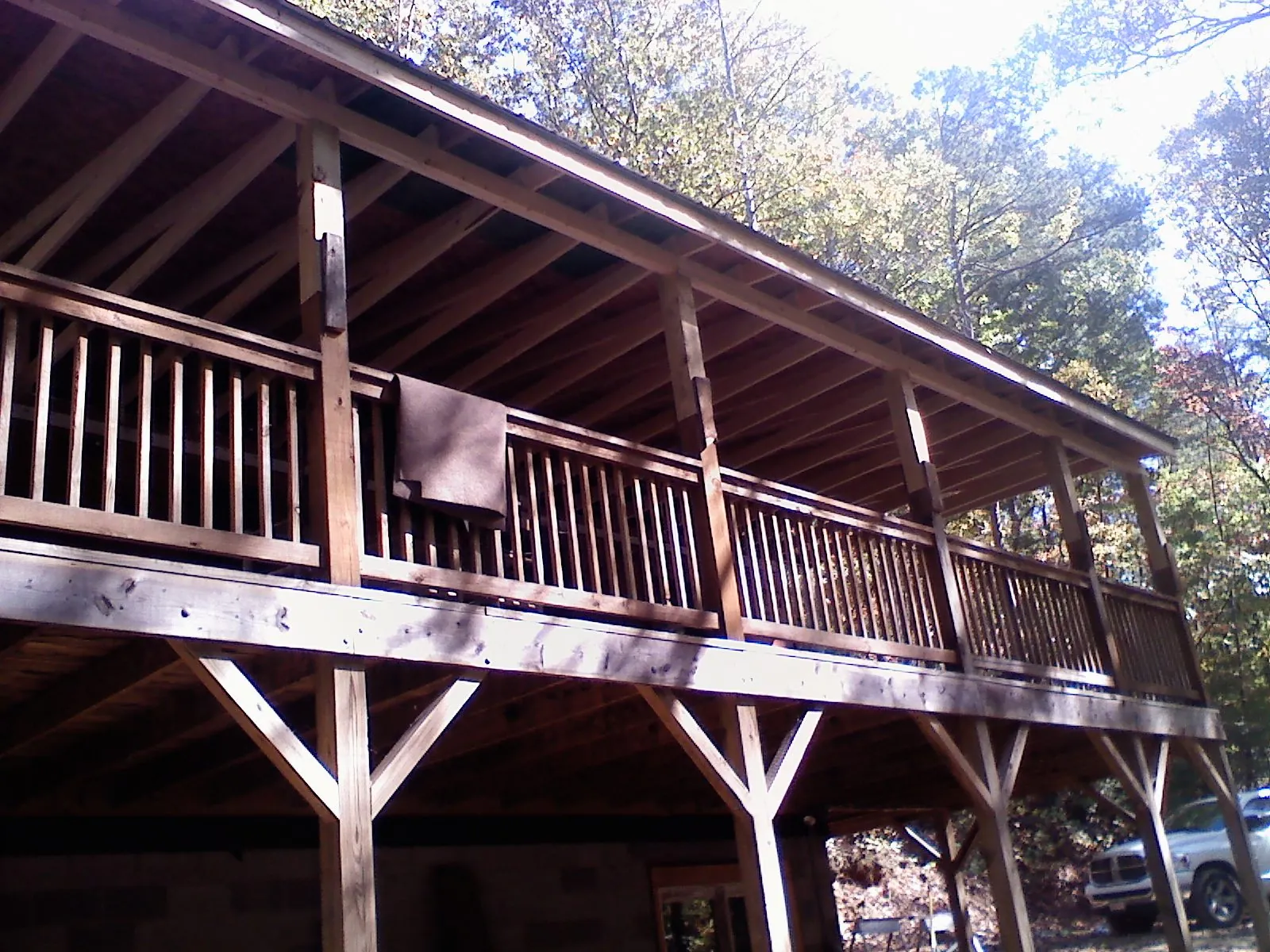 Timber framing under a new elevated porch and deck — Roof Leak Repair in Normandy by Roofing Brothers
